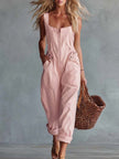 Light yellow denim square neck zip-front jumpsuit for women by FJØRNA, shown with front view highlighting style and fit