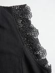FJØRNA black sleeveless hooded jumpsuit with vertical striped pattern, fitted pants style, and casual streetwear look.