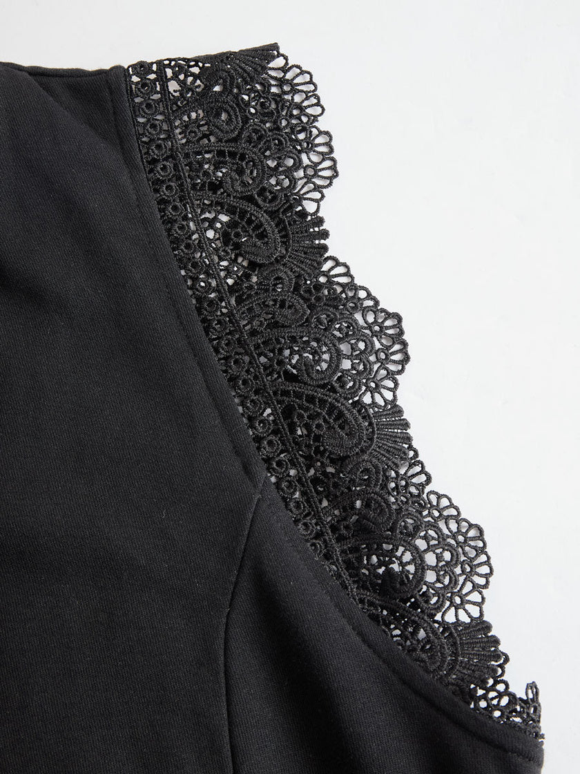 FJØRNA black sleeveless hooded jumpsuit with vertical striped pattern, fitted pants style, and casual streetwear look.
