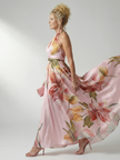 FJØRNA women's summer maxi dress with floral pattern, halter neck, sleeveless design, perfect for warm-weather occasions.