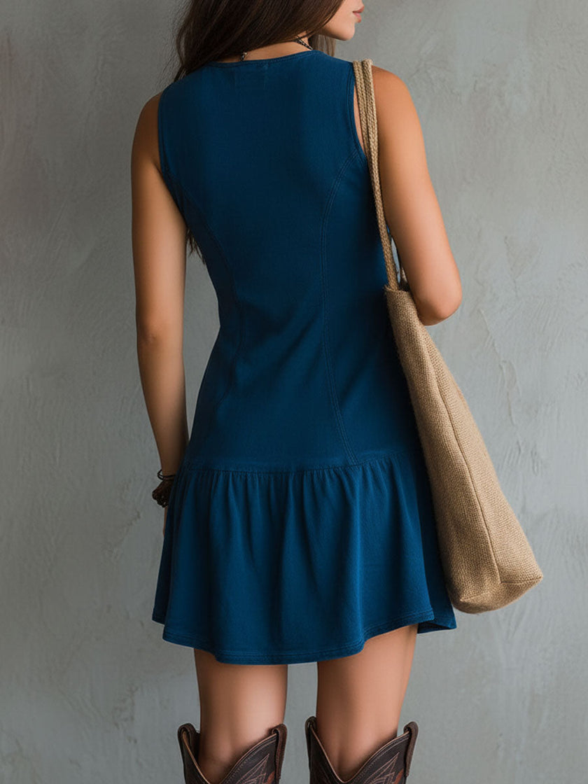 FJØRNA sleeveless mini casual dress with a fitted bodice and flowy skirt, perfect for warm weather and casual outings.
