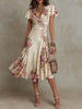 FJØRNA chiffon floral midi dress with flowy fabric and elegant design, perfect for evening occasions.