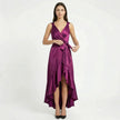 Elegant women's sleeveless wrap midi dress by FJØRNA, showcasing a flowing design and sophisticated style.