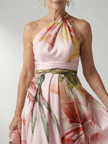 FJØRNA women's summer maxi dress with floral pattern, halter neck, sleeveless design, perfect for warm weather and casual occasions.