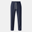 Men's wide-leg drawstring joggers by FJØRNA, relaxed casual sweatpants in soft fabric with elastic waistband and relaxed fit.