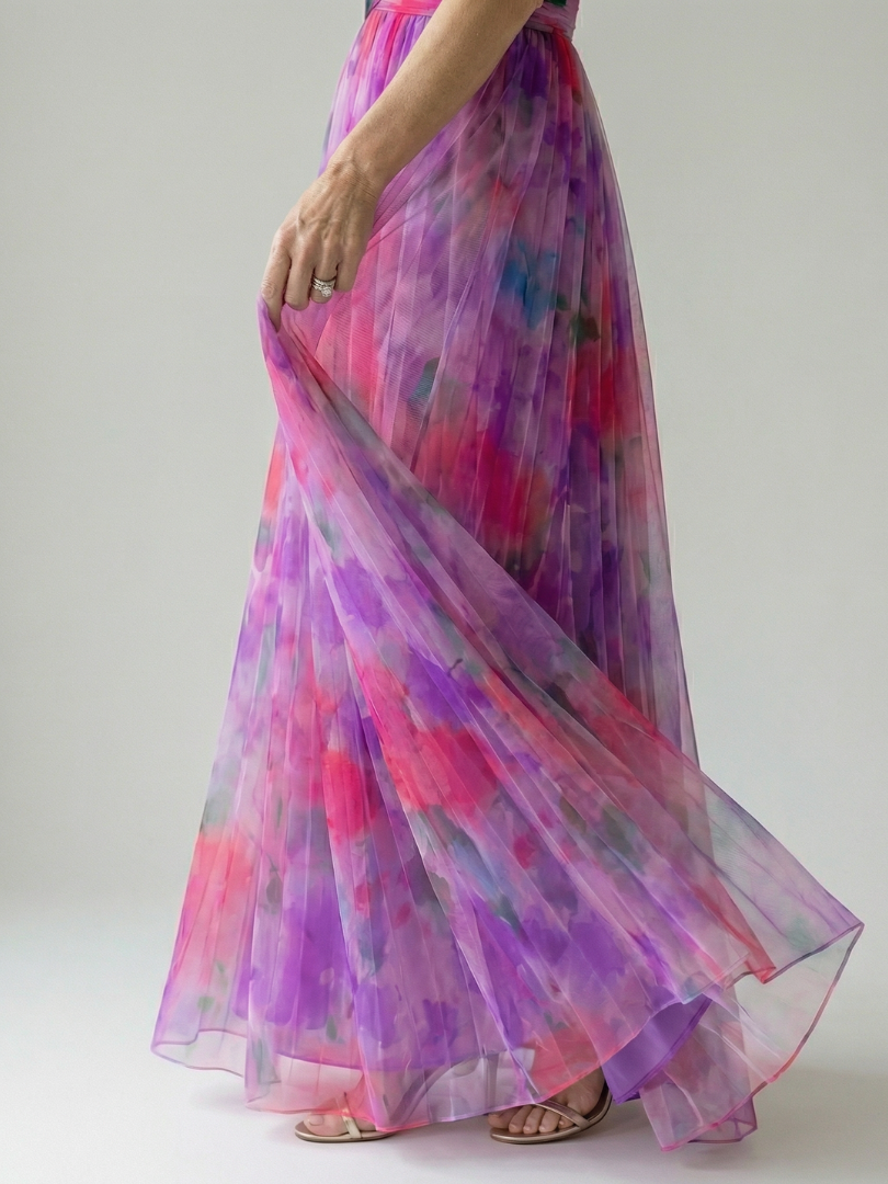 FJØRNA women's sleeveless summer maxi dress with a flowing, lightweight fabric, perfect for warm weather and casual wear.