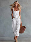 Light yellow denim jumpsuit for women with square neckline and zip-front, stylish FJØRNA pants in a casual, trendy design.