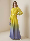 FJØRNA high-waisted long sleeve maxi dress with belt, contrast color gradient, pleated design and split-joint round neck.