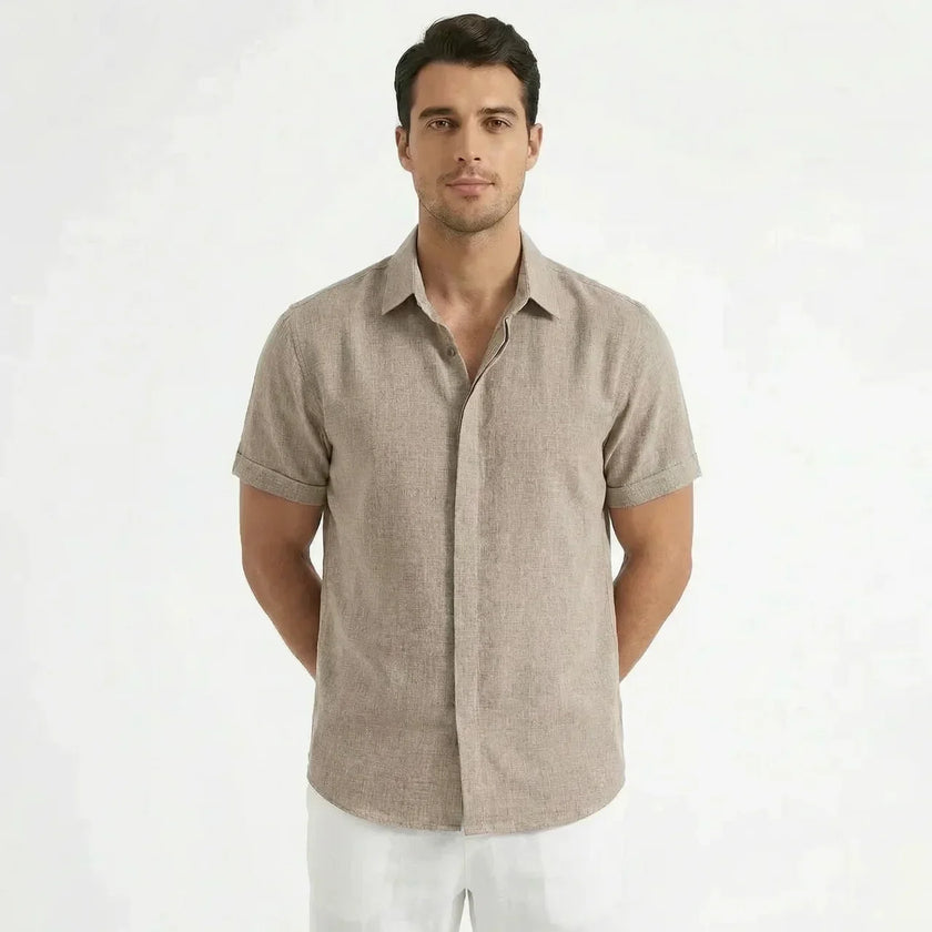 Men's cotton-linen short sleeve shirt by FJØRNA, shown in a relaxed fit with a classic collar and natural fabric texture.