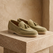 Men's casual suede shoes by FJØRNA, smart lace-up shoes with a sleek design, featuring a close-up of the tan suede material and laces.