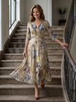 FJØRNA women's floral summer maxi dress with V-neck wrap design, flowing fabric and elegant style.
