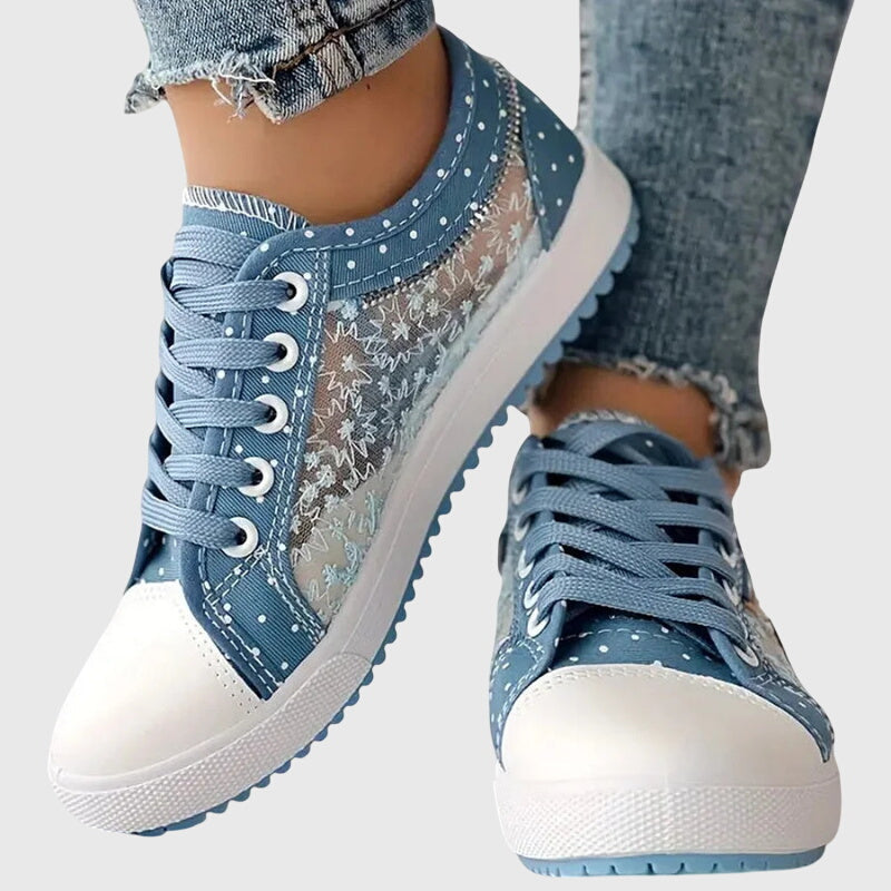FJØRNA women's orthopedic sneakers with breathable mesh upper and cushioned insole for comfort and support.