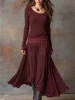 Charcoal knit maxi dress for women by FJØRNA, featuring a flowing silhouette and cozy knit fabric.