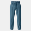 Men's wide-leg drawstring joggers by FJØRNA, relaxed casual sweatpants with a comfortable fit and adjustable waistband.