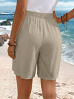 FJØRNA lightweight summer women's shorts with elastic waist and button front, casual and comfortable for warm weather.