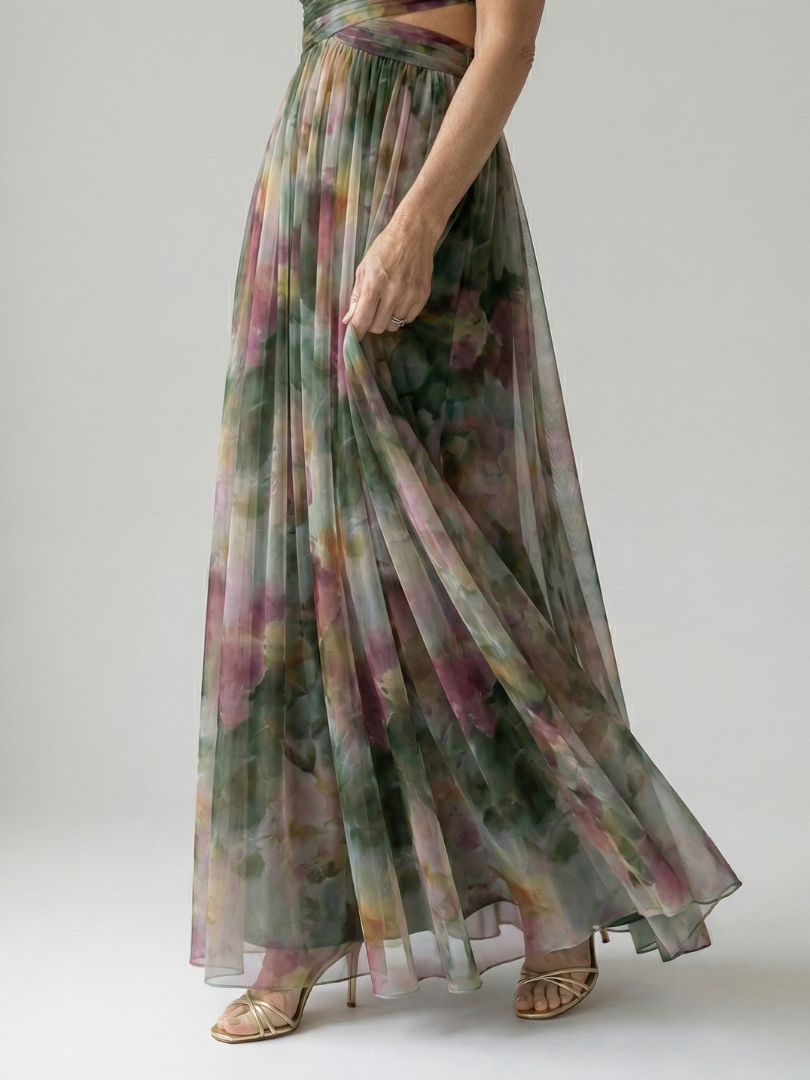 FJØRNA women's sleeveless summer maxi dress with wrap design, flowing fabric and elegant style for warm weather wear.