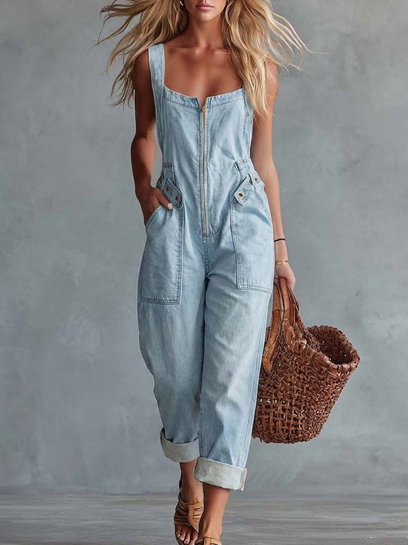 Light yellow denim jumpsuit for women with square neckline and zip-front, by FJØRNA, featuring stylish pant design.