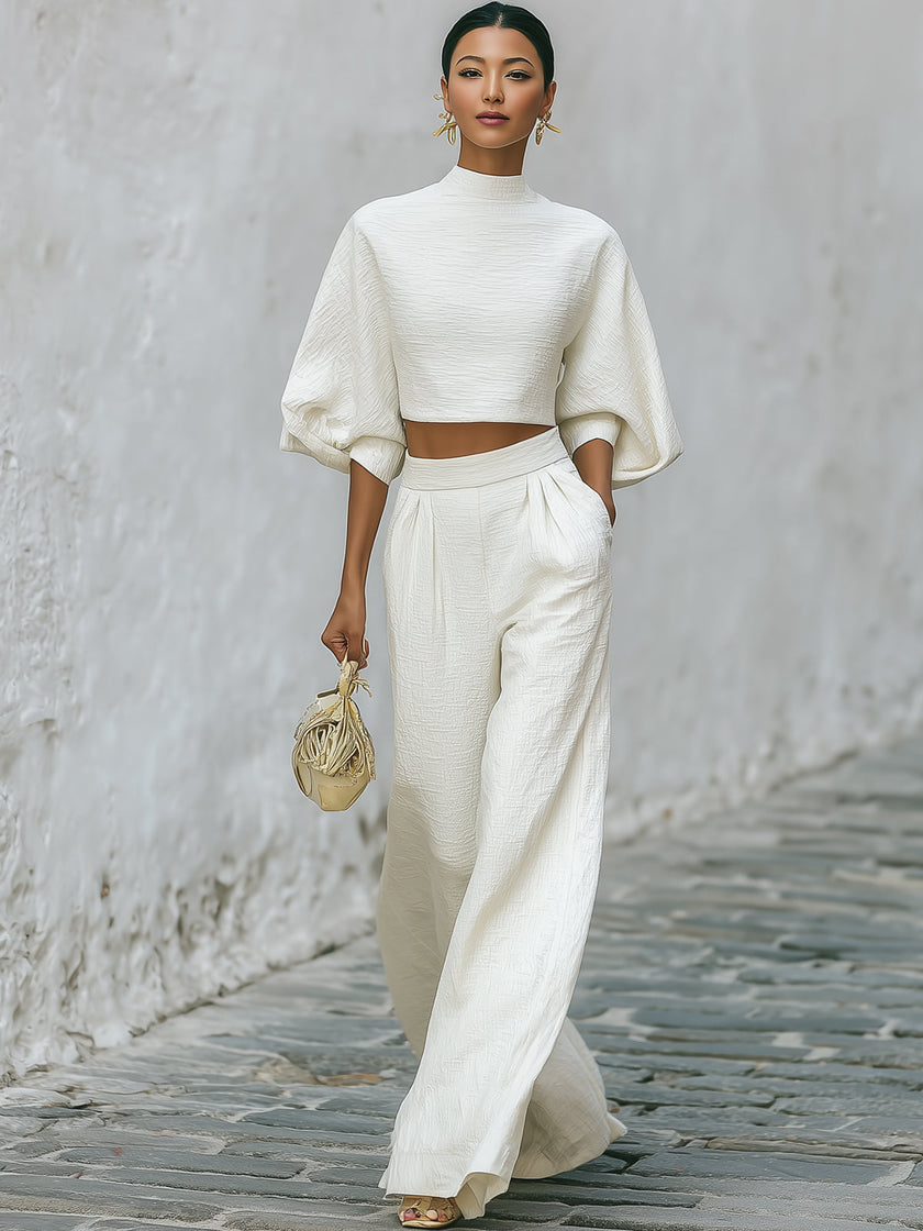 Cream textured lantern sleeve two-piece set with pants for women by FJØRNA, featuring a stylish and comfortable design.