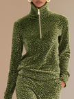 FJØRNA women's green leopard print velvet top and skirt set, stylish pants with bold animal print and soft velvet fabric.
