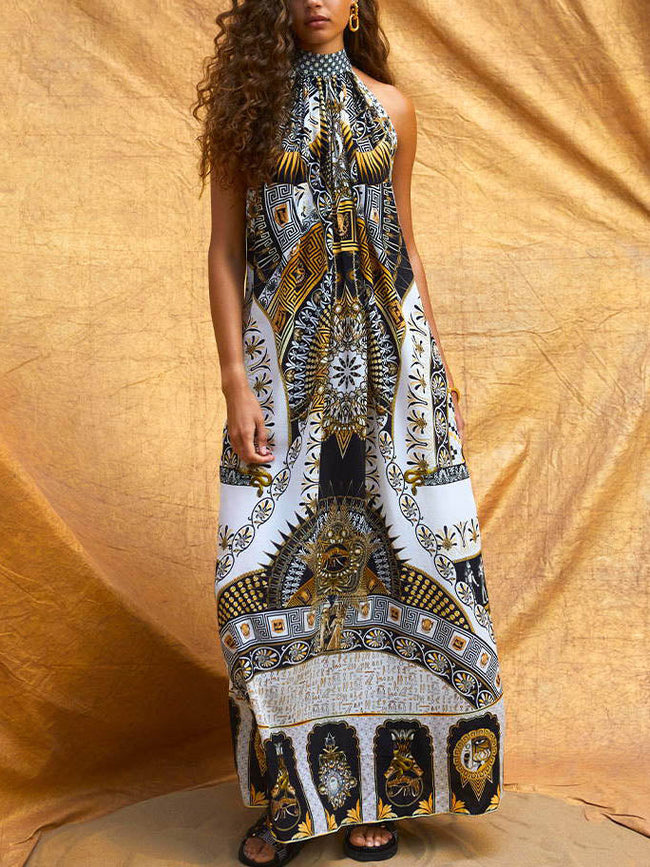 FJØRNA women's maxi dress with vibrant retro pattern print, perfect for summer, featuring a flowy silhouette and bold design.