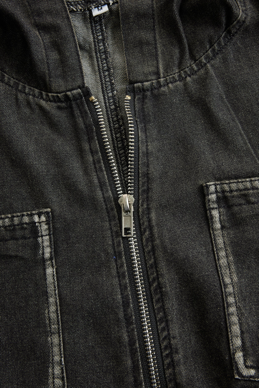 FJØRNA women's casual denim jumpsuit with loose fit, long sleeves, hood, zipper, and retro pocket design.