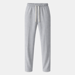 Men's wide-leg FJØRNA drawstring joggers featuring relaxed fit, casual sweatpants with elastic waistband and side pockets.
