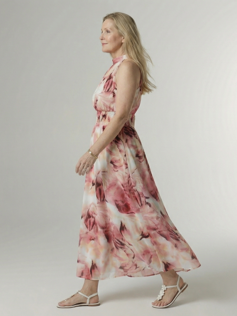 FJØRNA women's summer midi dress with halter neck and sleeveless design, casual style, shown on a model.