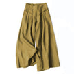 FJØRNA women's lightweight summer trousers with wide leg, high waist, and side pockets, perfect for casual warm-weather wear.