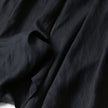 FJØRNA women's lightweight summer trousers with wide legs, high waist, and side pockets, perfect for casual warm-weather wear.
