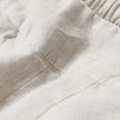 Women’s lightweight summer trousers by FJØRNA with wide legs, high waist, and side pockets, perfect for casual warm-weather wear.