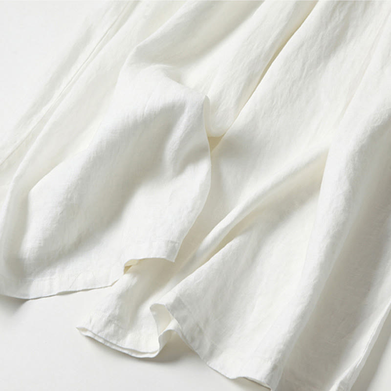 FJØRNA women's lightweight summer trousers with wide leg, high waist, and pockets, perfect for casual warm-weather wear.