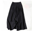 FJØRNA women's lightweight summer trousers with wide legs, high waist, and front pockets, perfect for casual warm-weather wear.