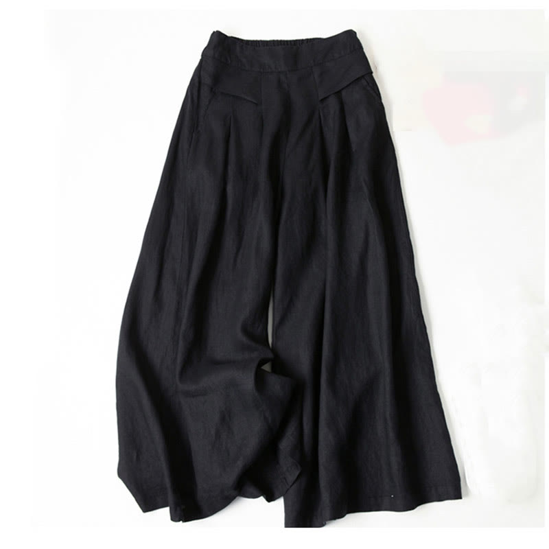 FJØRNA women's lightweight summer trousers with wide legs, high waist, and front pockets, perfect for casual warm-weather wear.