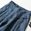 FJØRNA women's lightweight summer trousers with wide legs, high waist, and front pockets, styled for casual wear.