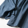 FJØRNA women's lightweight summer trousers with wide leg, high waist, and pockets, perfect for casual warm-weather wear.