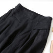 FJØRNA women's lightweight summer trousers with wide legs, high waist, and front pockets, perfect for warm-weather casual wear.