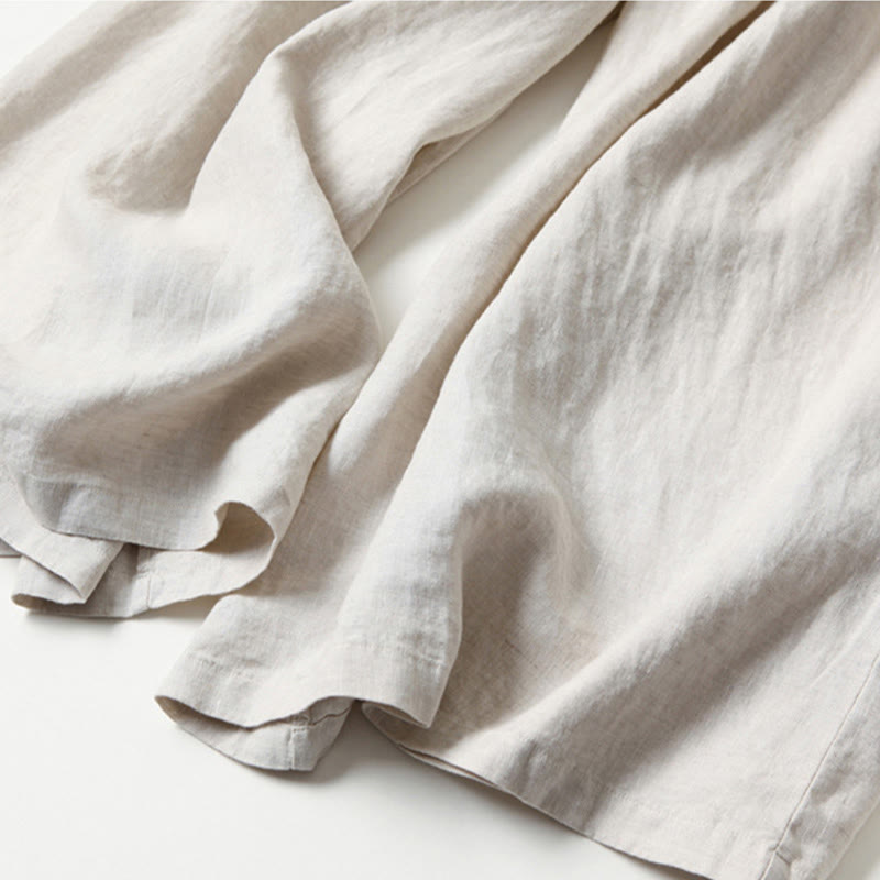 FJØRNA lightweight summer women's trousers with wide leg fit, high waist, and front pockets, ideal for casual warm-weather wear.