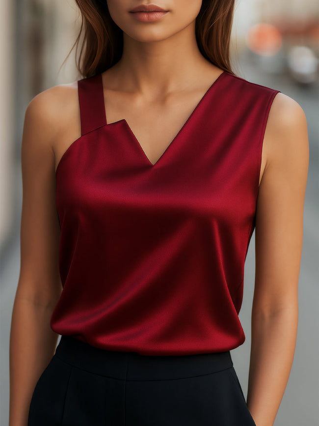 FJØRNA women's burgundy satin sleeveless blouse with asymmetric neckline, stylish top for women, elegant and modern design.