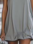 Grey sleeveless mini dress by FJØRNA, casual dress style, shown on a model with a fitted bodice and flared skirt.