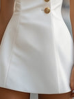 FJØRNA gold satin high-collar sheath dress with a sleek design, perfect for summer business occasions.