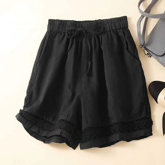 FJØRNA women's lightweight summer shorts with elastic waist and floral pattern, perfect for warm weather and casual wear.