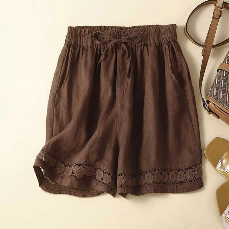 FJØRNA women's lightweight summer shorts with elastic waist and floral pattern, perfect for warm weather and casual wear.