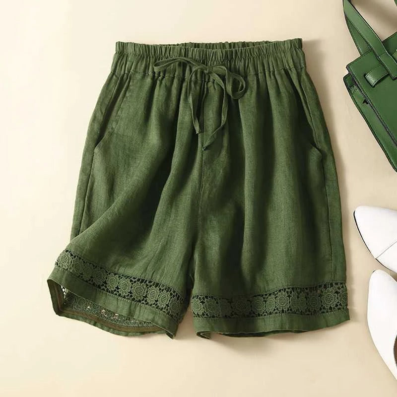 Lightweight women's summer shorts with elastic waist and floral pattern, by FJØRNA, perfect for warm weather and casual wear.