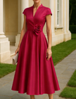Red satin midi dress for women by FJØRNA featuring a V-neck, A-line silhouette, and floral pattern.