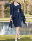 Navy blue tulle midi dress for women by FJØRNA, featuring pleated two-piece design and elegant flowing fabric.