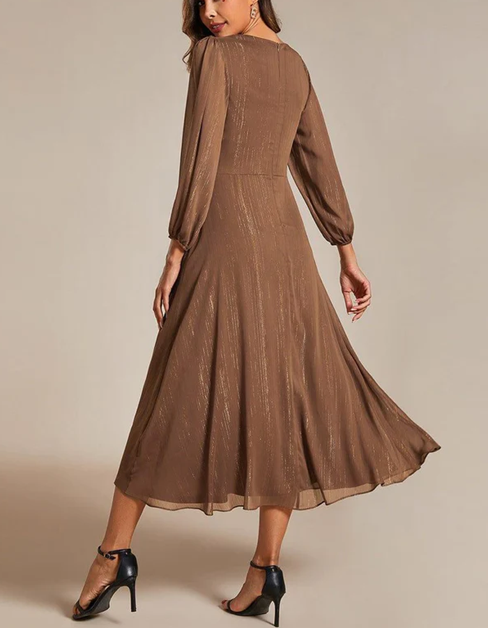 FJØRNA women's midi dress two-piece set featuring a stylish, flowing design with a fitted top and matching skirt.