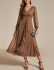 FJØRNA women's two-piece midi dress set featuring a stylish, flowy dress with a fitted top and elegant skirt for casual or formal wear.