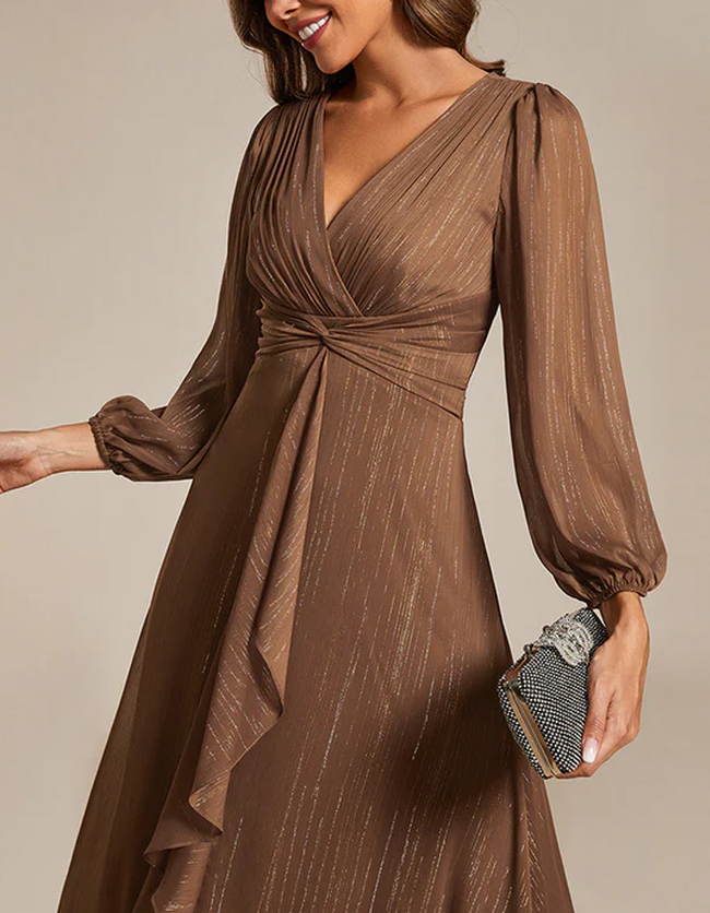 FJØRNA women's midi dress and two-piece set, stylish and elegant dress with flowing fabric and modern design.