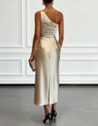 FJØRNA champagne satin midi dress for women, one-shoulder style with pleated design, elegant evening dress.