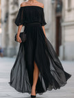FJØRNA off-shoulder pleated chiffon maxi dress for wedding guests, featuring flowing fabric and elegant design.